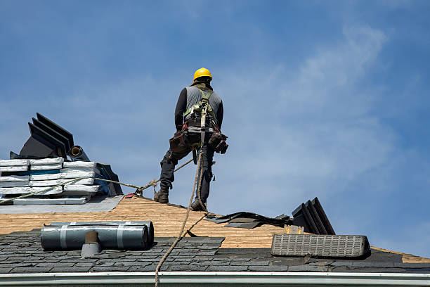 Professional Roof Replacement technician working in Dunbar, KY